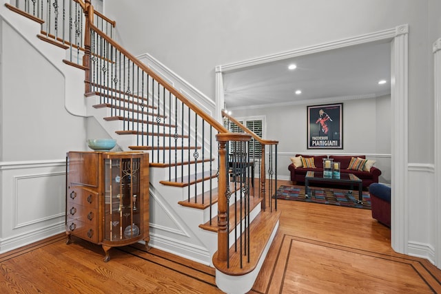2210 Center Ave, Northbrook, IL 60062 - staircase featuring crown molding, wood finished floors, and recessed lighting