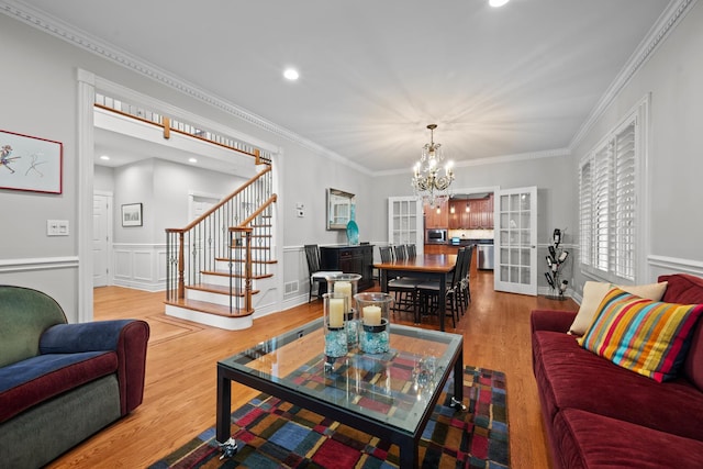 2210 Center Ave, Northbrook, IL 60062 - living room featuring stairway, a chandelier, wood finished floors, crown molding, and recessed lighting