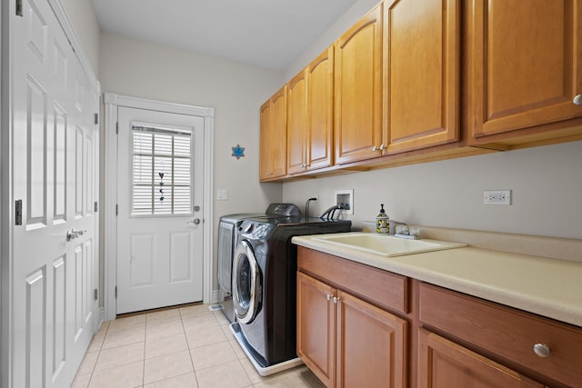 2210 Center Ave, Northbrook, IL 60062 - laundry room featuring cabinet space, independent washer and dryer, and light tile patterned floors