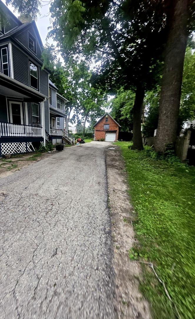 723 N County St, Waukegan, IL 60085 - view of asphalt driveway