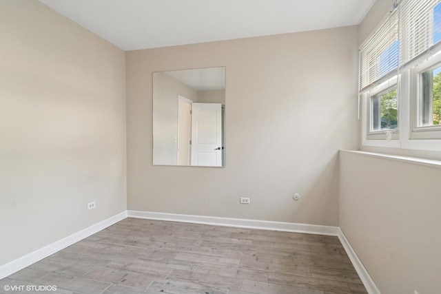4325 Sandlewood Ln, Hoffman Estates, IL 60192 - empty room with baseboards and light wood finished floors