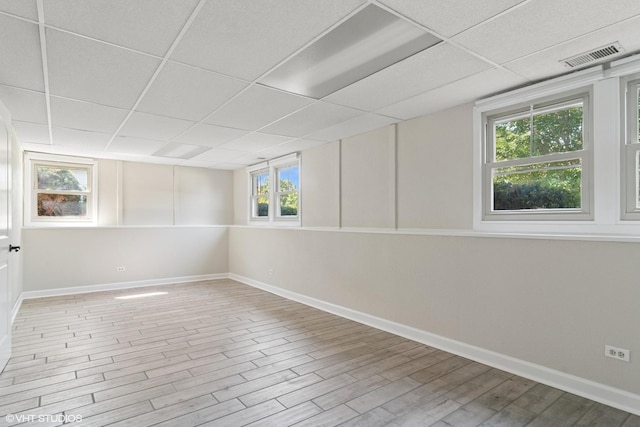 4325 Sandlewood Ln, Hoffman Estates, IL 60192 - empty room with a drop ceiling and wood finished floors