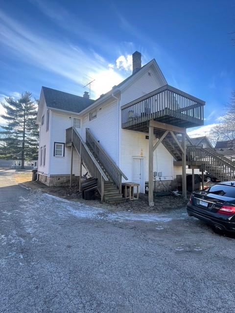 132 S Mchenry Ave, Crystal Lake, IL 60014 - back of house featuring stairs, a chimney, and a wooden deck