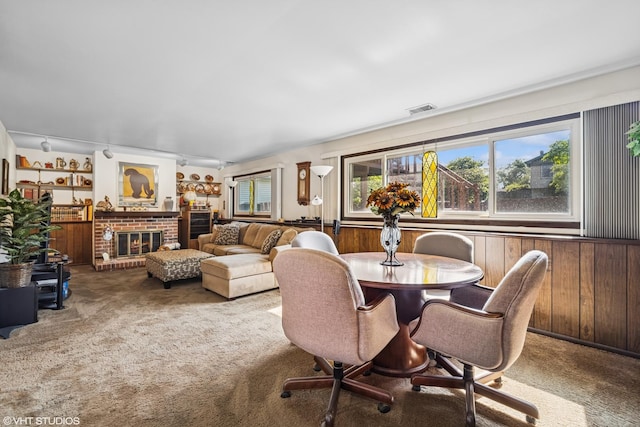 1583 Bayview Dr, Lake Zurich, IL 60047 - carpeted dining area featuring a fireplace