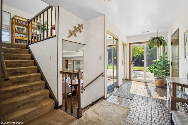 1583 Bayview Dr, Lake Zurich, IL 60047 - entrance foyer featuring stairway and baseboards