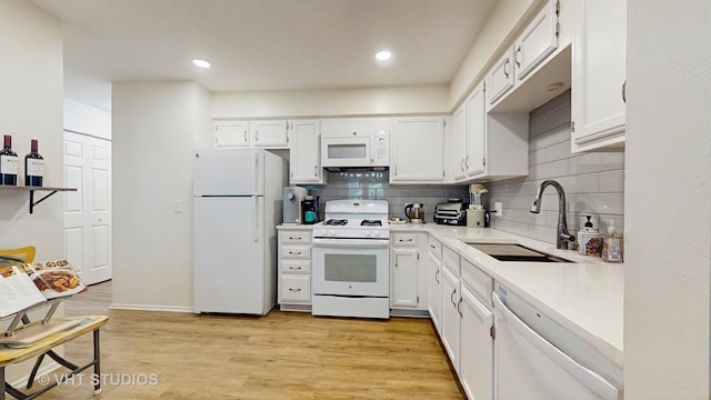 2328 Sedgfield Ct, Schaumburg, IL 60194 - kitchen featuring white appliances, decorative backsplash, light countertops, white cabinetry, and recessed lighting