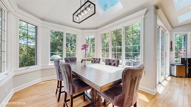 761 Reserve Ct, South Elgin, IL 60177 - sunroom featuring a skylight and hardwood / wood-style floors