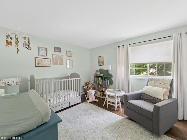 1339 Fowler Ave, Evanston, IL 60201 - bedroom with wood finished floors and a nursery area