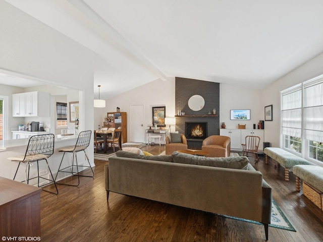 1339 Fowler Ave, Evanston, IL 60201 - living area with dark wood-type flooring and a brick fireplace