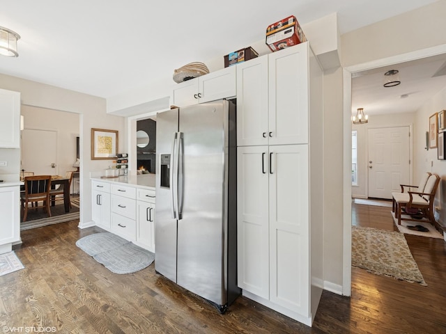 1339 Fowler Ave, Evanston, IL 60201 - kitchen with stainless steel refrigerator with ice dispenser, dark wood finished floors, and white cabinetry