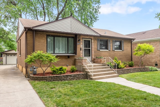 3941 Wesley Ave, Stickney, IL 60402 - view of front of home with an outdoor structure, a front yard, and brick siding
