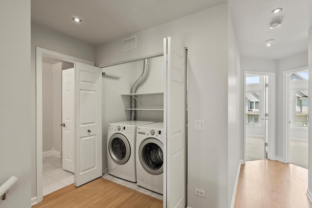 377 Aaron Ln, Bolingbrook, IL 60440 - laundry area with light wood-type flooring, washer and dryer, and recessed lighting