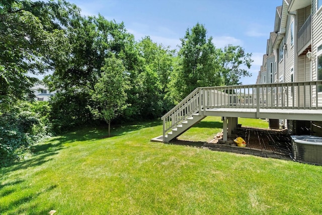 377 Aaron Ln, Bolingbrook, IL 60440 - view of grassy yard featuring stairway and a wooden deck