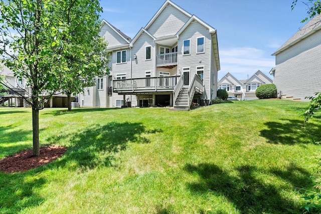 377 Aaron Ln, Bolingbrook, IL 60440 - back of house featuring a yard, stairs, and a wooden deck
