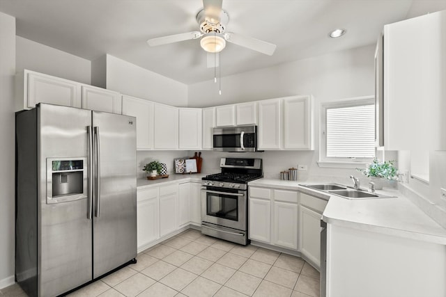377 Aaron Ln, Bolingbrook, IL 60440 - kitchen featuring stainless steel appliances, light tile patterned flooring, ceiling fan, white cabinets, and light countertops