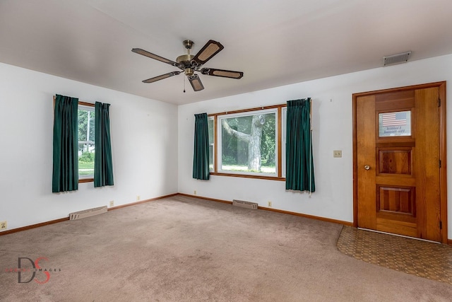 132 New St, Seneca, IL 61360 - carpeted entrance foyer with a ceiling fan and baseboards