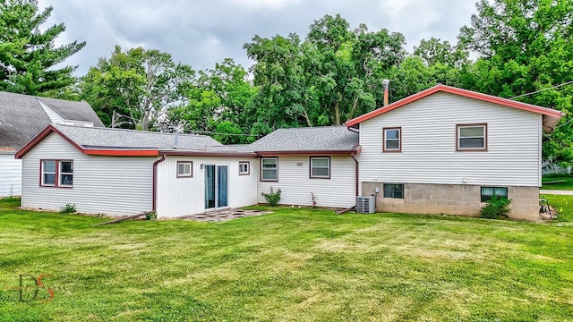 132 New St, Seneca, IL 61360 - back of property featuring a yard and view of scattered trees
