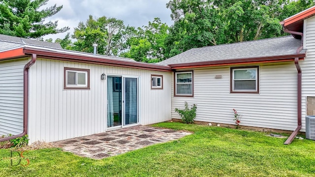 132 New St, Seneca, IL 61360 - back of house featuring a yard and roof with shingles