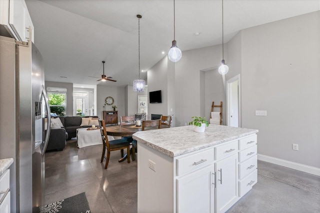 3013 E Stillwater Lndg Unit 3013, Urbana, IL 61802 - kitchen featuring stainless steel fridge with ice dispenser, finished concrete floors, a ceiling fan, a center island, and lofted ceiling
