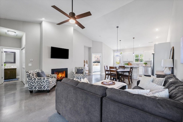 3013 E Stillwater Lndg Unit 3013, Urbana, IL 61802 - living area with a lit fireplace, a ceiling fan, recessed lighting, and high vaulted ceiling
