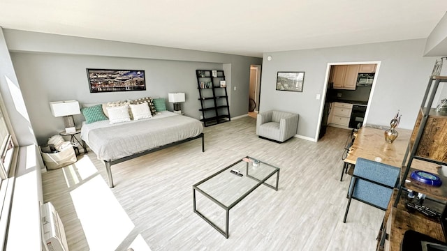3600 N Lake Shore Dr Unit 2223, Chicago, IL 60613 - bedroom featuring light wood-type flooring and a spacious closet