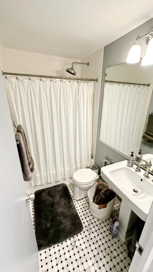 3600 N Lake Shore Dr Unit 2223, Chicago, IL 60613 - full bathroom with tile patterned floors and a shower with shower curtain