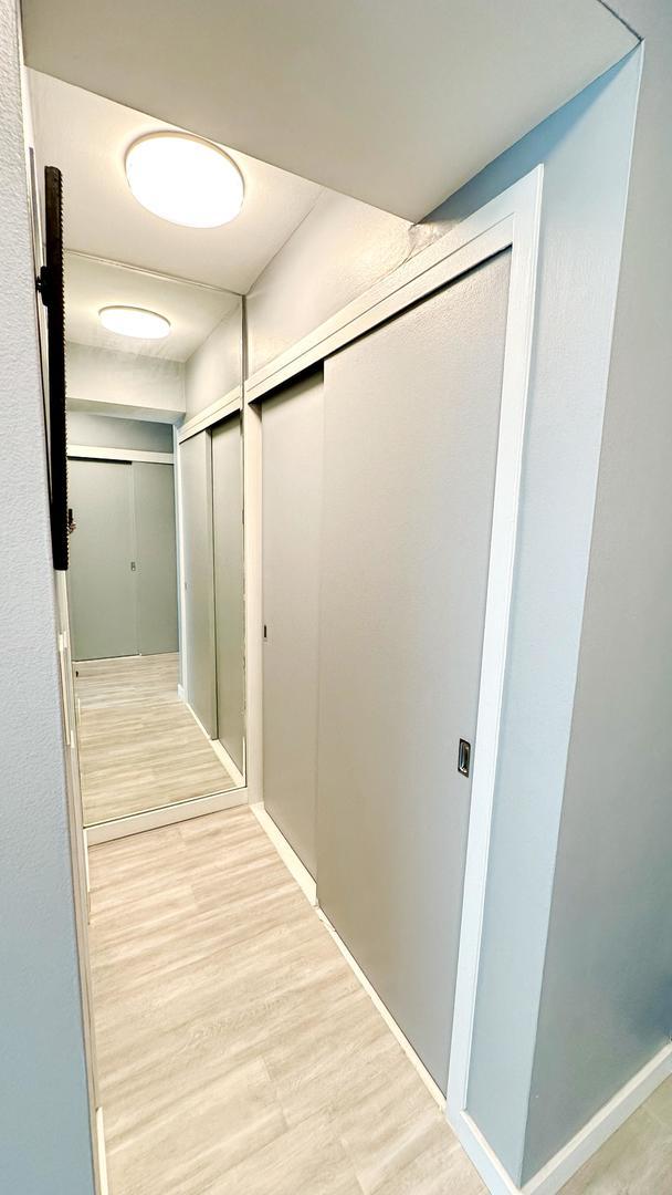 3600 N Lake Shore Dr Unit 2223, Chicago, IL 60613 - hallway featuring light wood-type flooring