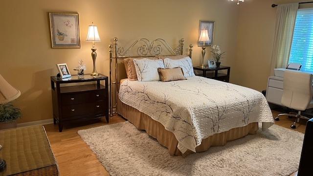 13216 N Country Club Ct Unit 2Aa, Palos Heights, IL 60463 - bedroom featuring light wood finished floors and baseboards