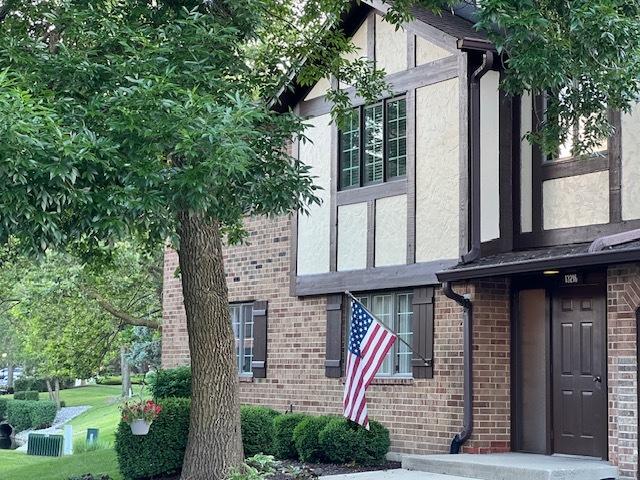 13216 N Country Club Ct Unit 2Aa, Palos Heights, IL 60463 - view of side of property with stucco siding and brick siding