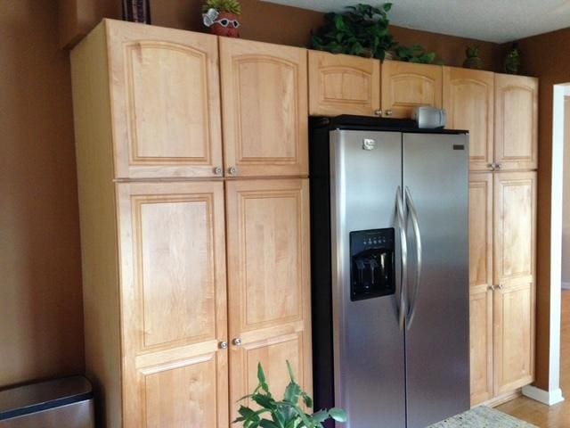 13216 N Country Club Ct Unit 2Aa, Palos Heights, IL 60463 - kitchen featuring stainless steel fridge with ice dispenser and light brown cabinetry