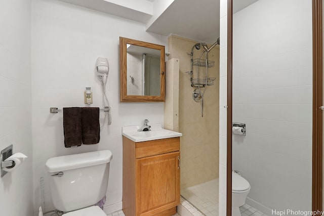 1569 Sherman Pl, Des Plaines, IL 60016 - full bath featuring tile walls, vanity, a shower stall, and tile patterned floors