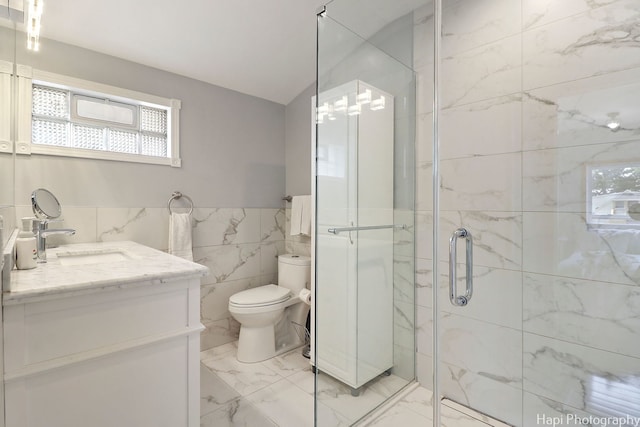 1569 Sherman Pl, Des Plaines, IL 60016 - full bathroom featuring tile walls, vanity, marble finish flooring, a stall shower, and a wainscoted wall