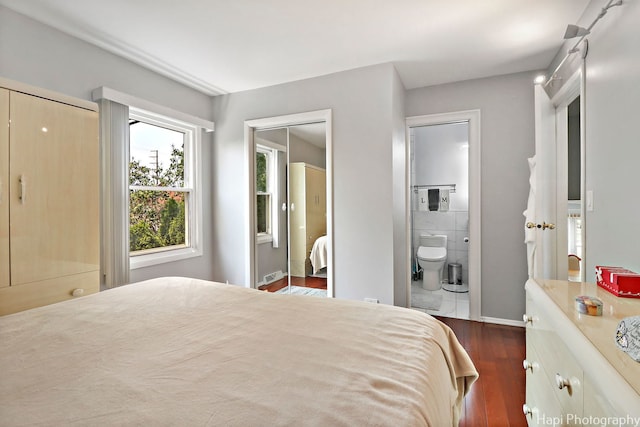 1569 Sherman Pl, Des Plaines, IL 60016 - bedroom with dark wood-style floors and ensuite bathroom