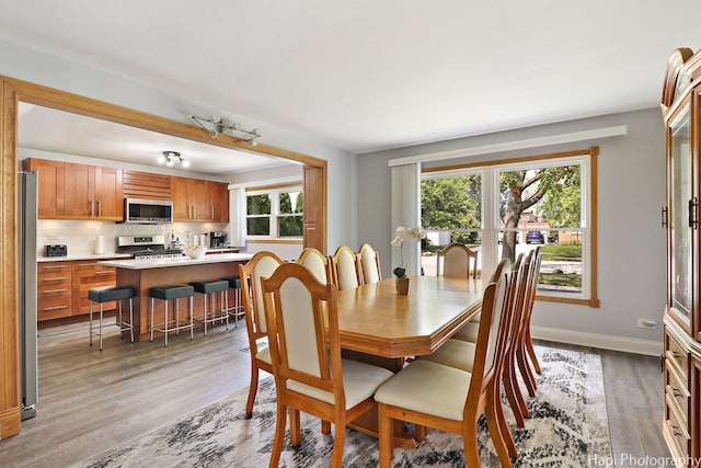 1569 Sherman Pl, Des Plaines, IL 60016 - dining room with light wood finished floors and baseboards
