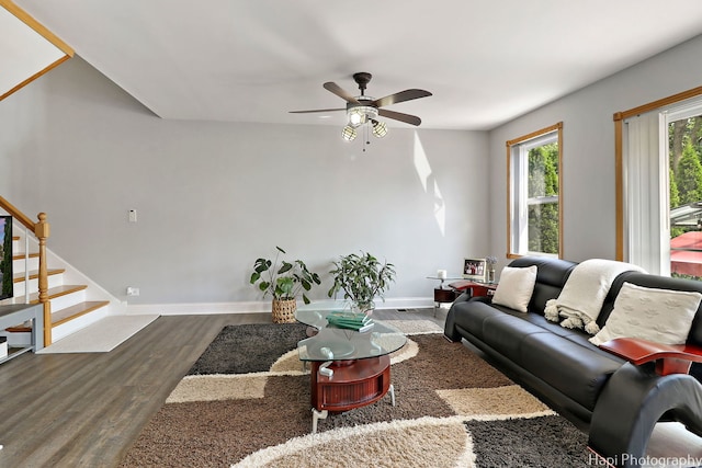 1569 Sherman Pl, Des Plaines, IL 60016 - living area featuring wood finished floors, a ceiling fan, and stairs