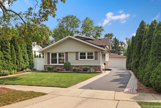 1569 Sherman Pl, Des Plaines, IL 60016 - view of front facade with a garage, brick siding, and an outdoor structure