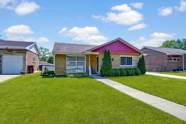 733 Ashland Ave, Chicago Heights, IL 60411 - ranch-style house with a front yard, brick siding, and concrete driveway