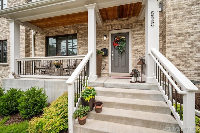 520 Ohio Ave, Saint Charles, IL 60174 - entrance to property with covered porch and brick siding
