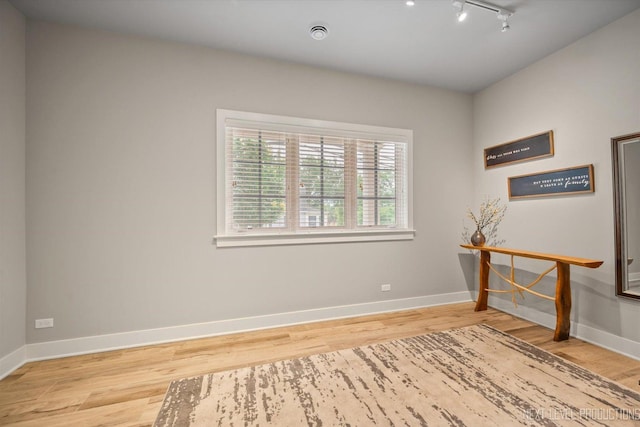 520 Ohio Ave, Saint Charles, IL 60174 - spare room with wood finished floors and track lighting