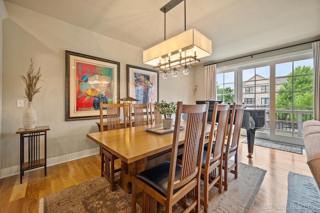 520 Ohio Ave, Saint Charles, IL 60174 - dining area with wood finished floors and a chandelier