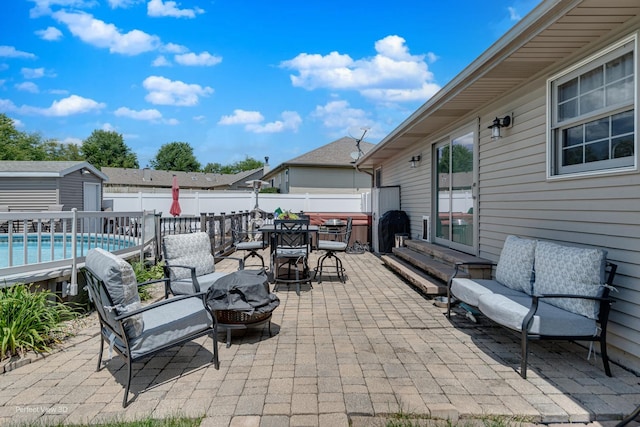 1245 Patriot Way, Bourbonnais, IL 60914 - view of patio / terrace featuring an outdoor fire pit, a shed, outdoor dining space, and entry steps