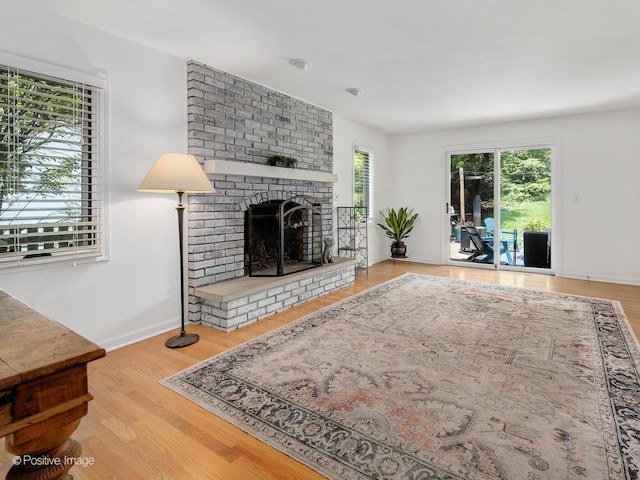 262 Sheffield Ln, Glen Ellyn, IL 60137 - living room with a brick fireplace and wood finished floors