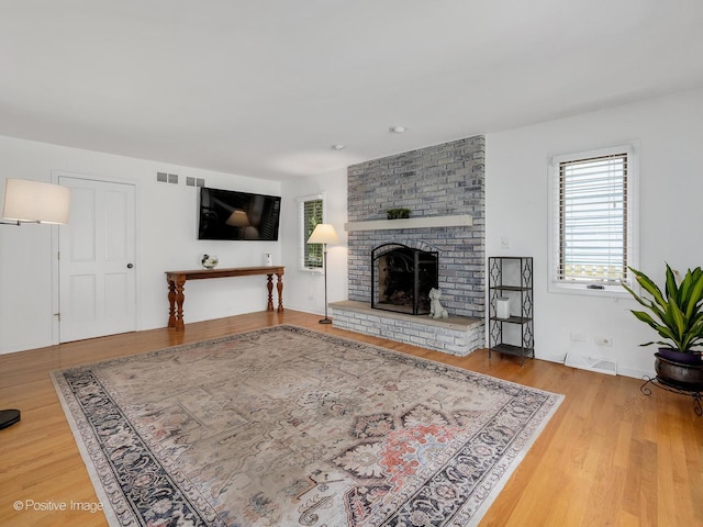 262 Sheffield Ln, Glen Ellyn, IL 60137 - living area featuring a fireplace and wood finished floors