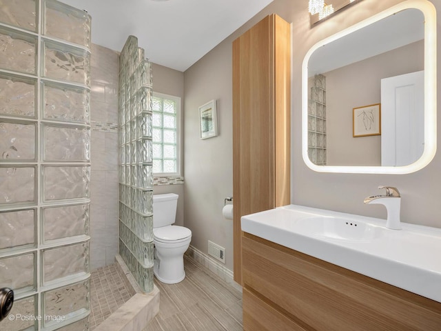 262 Sheffield Ln, Glen Ellyn, IL 60137 - full bathroom featuring walk in shower, vanity, and wood finished floors