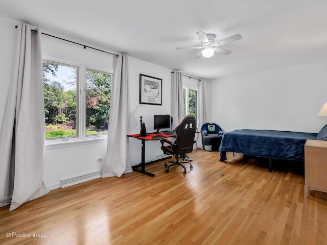 262 Sheffield Ln, Glen Ellyn, IL 60137 - bedroom with light wood-style flooring, baseboard heating, and a desk