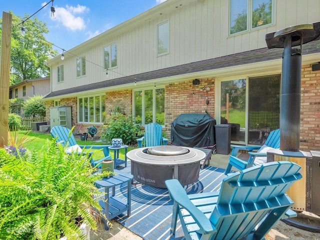 262 Sheffield Ln, Glen Ellyn, IL 60137 - wooden deck with a fire pit, area for grilling, and a patio area