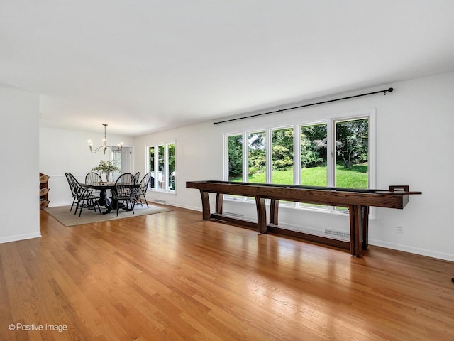 262 Sheffield Ln, Glen Ellyn, IL 60137 - dining area featuring a chandelier and light wood finished floors