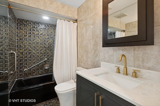 9331 Landings Ln Unit 204, Des Plaines, IL 60016 - bathroom featuring tile walls, shower / bath combo with shower curtain, and vanity