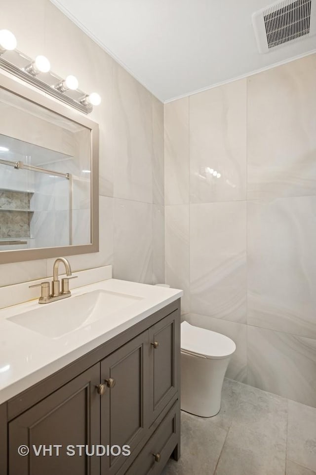 9331 Landings Ln Unit 204, Des Plaines, IL 60016 - full bathroom featuring tile walls, vanity, a shower, and tile patterned floors