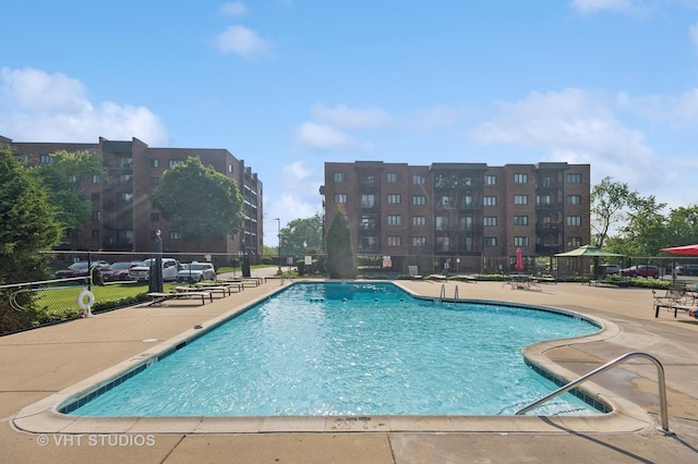 9331 Landings Ln Unit 204, Des Plaines, IL 60016 - community pool featuring a patio